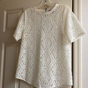 Banana Republic daisy crochet top with half zipper back. Size small.